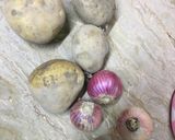 A picture of step 2 of Aloo Mater salan.