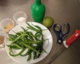 A picture of step 1 of Green Chilli Pickle with lemon juice.
