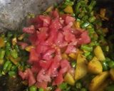A picture of step 3 of Dry Potato-French Beans.