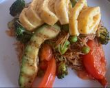 A picture of step 8 of Stir fried noodle with cheesy Tamagoyaki and grilled soysauce avocado.