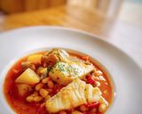 Une image de l'étape 7 de Bacalao con alcachofas i alubias.