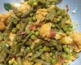 A picture of step 3 of Cauliflower French Beans and Green Peas Curry.