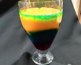 A picture of step 2 of Devil's Knight Layered Mocktail.