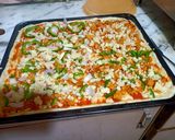 A picture of step 7 of Chicken tikka pizza.