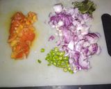 A picture of step 2 of Brinjal bharta.