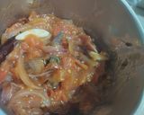 A picture of step 2 of Dosa with tomato onion chutney.