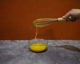 A picture of step 5 of Molecular gastronomy-mango juice spherification.