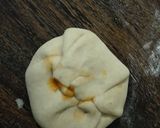 A picture of step 6 of Pizza paratha.