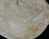 A picture of step 12 of Malabar Parotta.