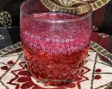 A picture of step 5 of Rooh afza drink with chia seeds.
