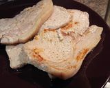 A picture of step 3 of Pork Chops Cooked in Milk and Herbs.