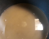 A picture of step 1 of Pickled Asparagus with an Onion.