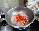 A picture of step 3 of Bhounwa kadu chicken.