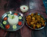 A picture of step 39 of Aloo fulcopi katla rosha ar misti doi.