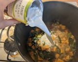 A picture of step 7 of Sweet potato and coconut green thai curry soup.