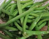 A picture of step 1 of French beans with methi.
