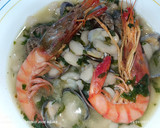 Foto del paso 7 de la receta: Judías del ganchet con almejas japonesas y gambas rojas