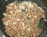 Foto del paso 4 de la receta: Calabacines rellenos de carne picada