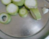 A picture of step 1 of Lauki rings with burfi.