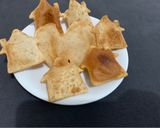 A picture of step 2 of Puri in Heart and hut shape.