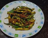 A picture of step 3 of Kurkuri Bhindi.