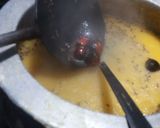 A picture of step 6 of Daal Chawal with fry Fish.