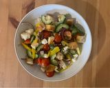 A picture of step 4 of Greek Panzanella Salad.