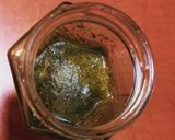 A picture of step 6 of Grilled Artichokes with Garlic, Oil, and Parsley Dressing.