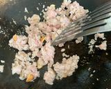 A picture of step 3 of Thai style egg noodles stir-fry served with fried egg.