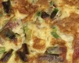 Foto del paso 2 de la receta Tortilla de ajetes y jamón con tomate natural