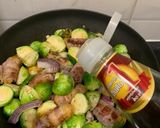 A picture of step 2 of Pig in Blankets and Brussel sprouts with sweet plum sauce.