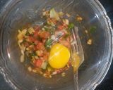A picture of step 2 of Masala omellette.