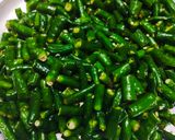 A picture of step 1 of Green chilli pickle.
