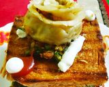 A picture of step 7 of Spinach & Veggie stuffed Momo Sandwich.