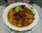 A picture of step 9 of Desi Spiced Chickpeas and Potatoes.