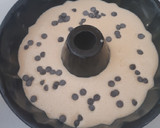 Foto del paso 4 de la receta: Bizcocho de naranja bañado en chocolate con almendras laminadas