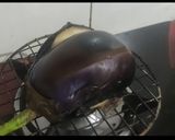 A picture of step 1 of Baingan/eggplant bharta.