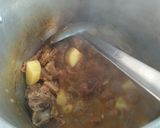 A picture of step 3 of Alloo gosht.
