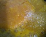 A picture of step 14 of Vanilla tutti fruity cake with Mango topping.