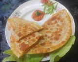 A picture of step 5 of Indian style cheese paneer veg pizza paratha.