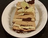 A picture of step 20 of Orange Milk Chocolate and White Chocolate Mousse Torte.