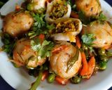 A picture of step 15 of Stuffed Riceballs tossed in mix vegetables.
