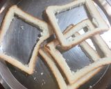 A picture of step 2 of Cheesy Egg Toast.