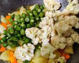 A picture of step 2 of Dabha Style Cauliflower Mix Veg.
