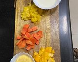 A picture of step 1 of Creamy Mango and papaya Smoothie.