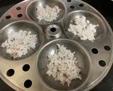 A picture of step 5 of Suji Idiyappam with coconut chutney.