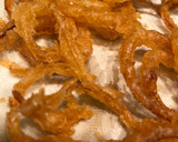 A picture of step 5 of String onion rings.