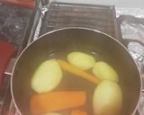 Foto del paso 1 de la receta: Salteado de pollo con ensalada de papas con zanahoria