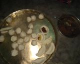 A picture of step 32 of Poush pitha thali.