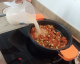 Foto del paso 3 de la receta: Arroz con butifarra y habas